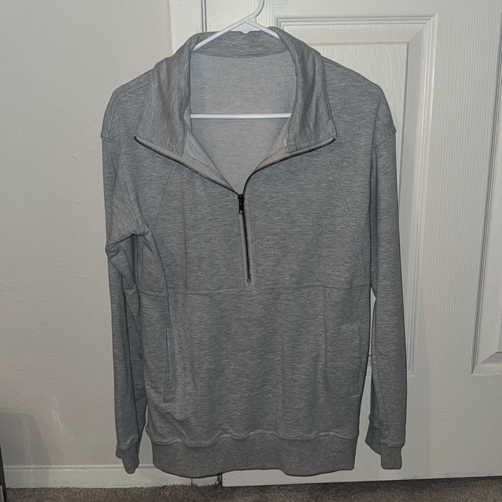 Grey 1/4 zip pullover.